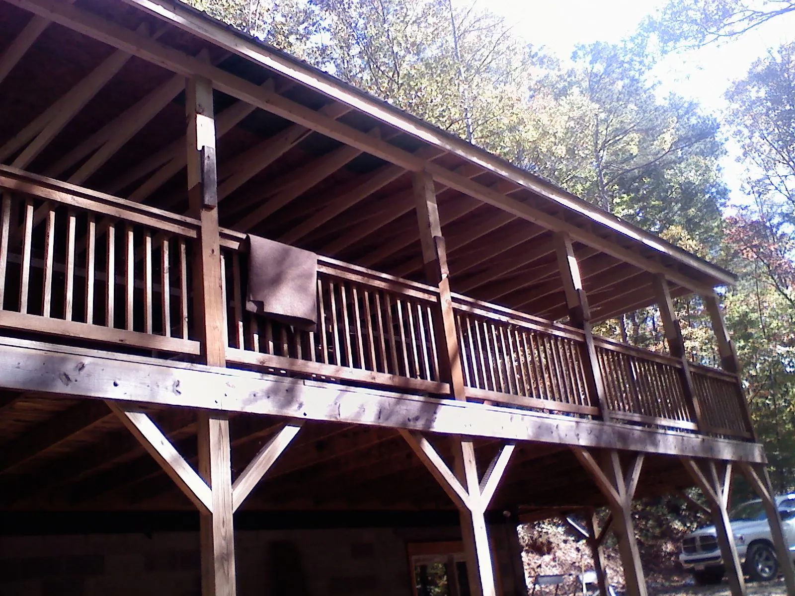 Timber framing under a new elevated porch and deck — Roof Leak Repair in Adair by Roofing Brothers